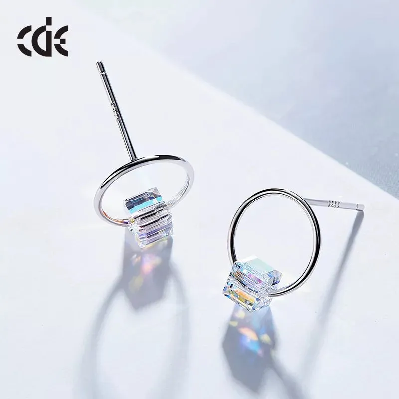 Sterling silver minimalist circle with a cubic crystal earring