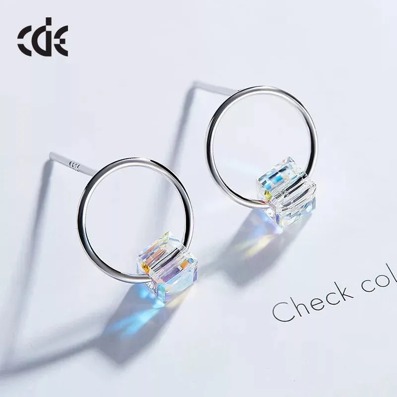 Sterling silver minimalist circle with a cubic crystal earring